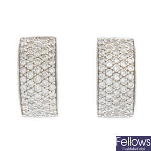 A pair of 18ct gold diamond hoop earrings.