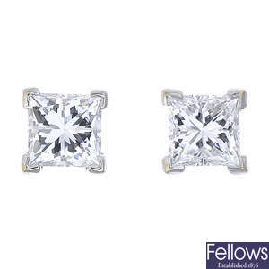 A pair of 18ct gold square-cut diamond stud earrings.