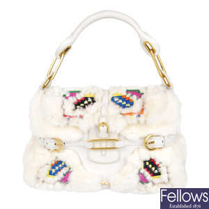 JIMMY CHOO - a white Tulita fur handbag.