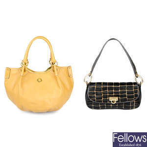 Two designer handbags.