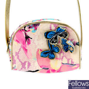 ROBERTO CAVALLI - a small butterfly canvas handbag and an unbranded python skin clutch.