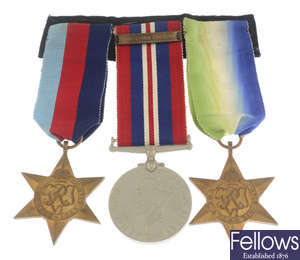 WWII medals, a group of four & a group of three, with postage boxes.