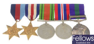 WWII medals, group of five on a bar & a group of four.