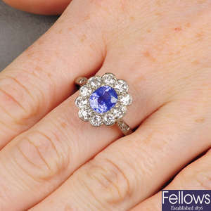 An early 20th century sapphire and old-cut diamond cluster ring.