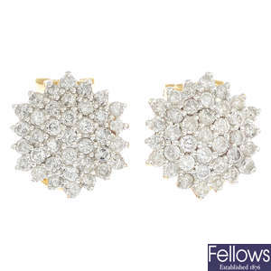 A pair of 18ct gold diamond cluster earrings.