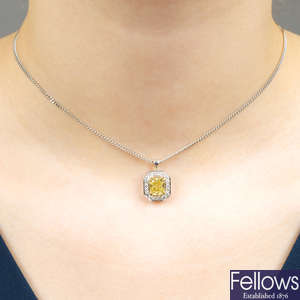 An 18ct gold Fancy Intense Yellow diamond and diamond cluster pendant, with curb-link chain.