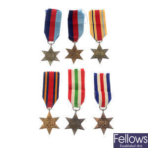 A large selection of assorted WWII medals, etc.