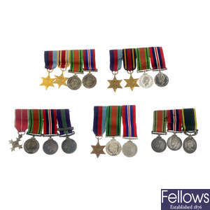 WWII, a selection of five mounted miniature medal groups.