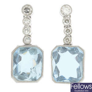 A pair of aquamarine and diamond drop earrings.
