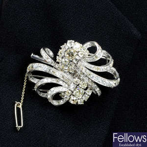 A mid 20th century platinum diamond double-clip brooch.