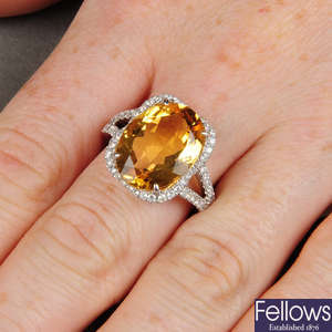 A citrine and diamond dress ring.