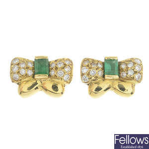 A pair of 18ct gold emerald and diamond bow earrings.