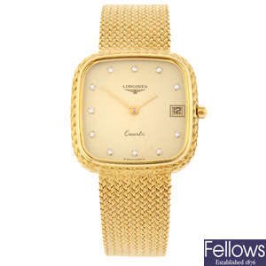 LONGINES - a gentleman's 18ct yellow gold bracelet watch.