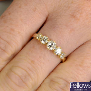 A graduated old-cut diamond five-stone ring.
