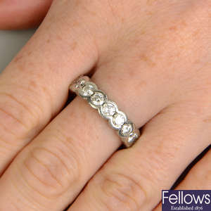 A platinum brilliant-cut diamond full eternity ring.