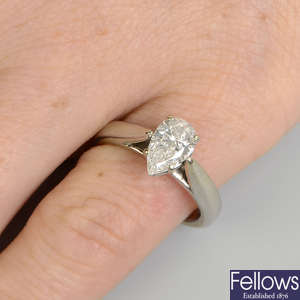 A pear-shape diamond single-stone ring.