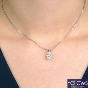 An 18ct gold oval-shape diamond single-stone pendant, with chain.