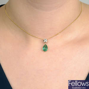 A Colombian emerald and brilliant-cut diamond pendant.