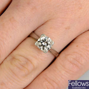 A circular-cut diamond single-stone ring.