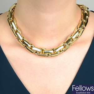 An 18ct gold curb-link necklace, by Kutchinsky.