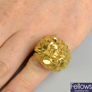 A 1960s 18ct gold angular, bombe dress ring, by Kutchinsky.