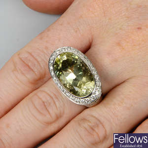 An 18ct gold prasiolite, diamond and tsavorite garnet dress ring.
