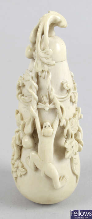 A 19th century carved ivory snuff bottle.