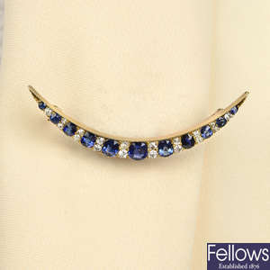 A late Victorian gold graduated sapphire and old-cut diamond crescent brooch.