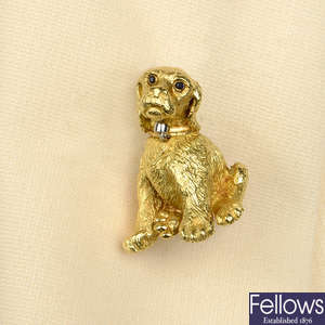 An 18ct gold puppy dog brooch, with sapphire and diamond accents, by Tiffany & Co.
