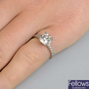 A platinum diamond single-stone 'Novo' ring, with brilliant-cut diamond line shoulders, by Tiffany & Co.