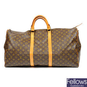 Sold at Auction: Louis Vuitton, Vintage Louis Vuitton Monogram Canvas  Portable Bandouliere Garment Bag