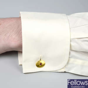 A pair of early 20th century 18ct gold old-cut diamond, sapphire and ruby cufflinks.