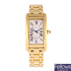 CARTIER - a lady's 18ct yellow gold Tank Americaine bracelet watch.