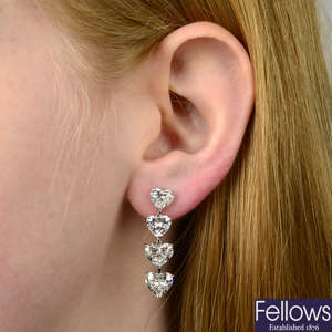 A pair of graduated heart-shape diamond earrings, by Moussaieff.