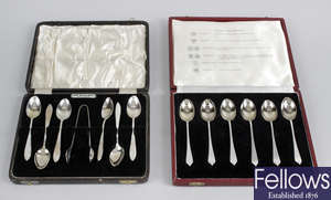 Three cased sets of 20th century silver spoons. 