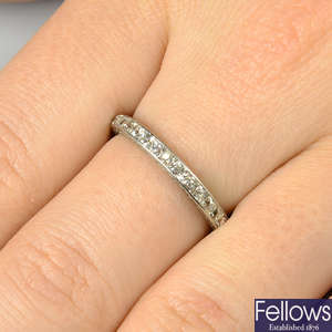 An early 20th century platinum square-shape old-cut diamond full eternity ring, by Lacloche Freres.