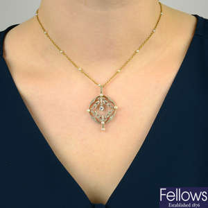 An early 20th century platinum and 18ct gold, diamond and seed pearl foliate pendant, with gold seed pearl chain.