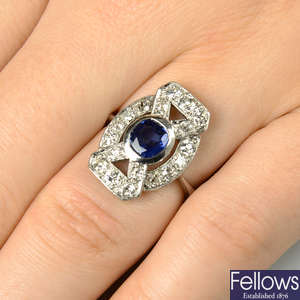 A mid 20th century platinum sapphire and diamond dress ring.