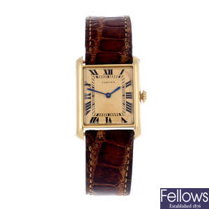 CARTIER - a mid-size yellow metal Must de Cartier wrist watch.
