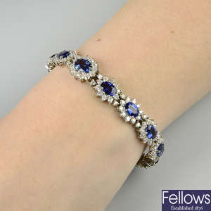 A sapphire and brilliant-cut diamond graduated cluster bracelet.