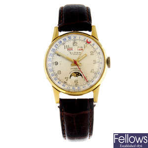 ELOGA - a gold filled triple date moonphase wrist watch, 33mm.