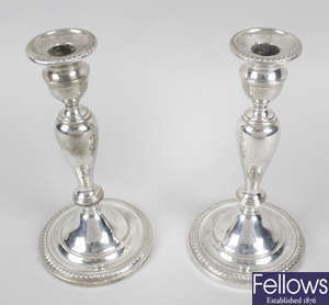 A pair of silver mounted candlesticks, probably American.