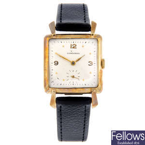 LONGINES - a gentleman's yellow metal wrist watch.