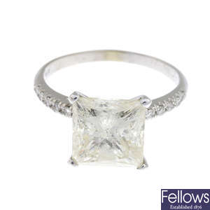 A square-shape fracture-filled and laser-drilled diamond single-stone ring.