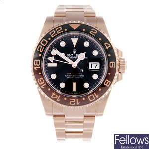 CURRENT MODEL: ROLEX - a gentleman's 18ct Everose gold Oyster Perpetual Date GMT-Master II bracelet watch.
