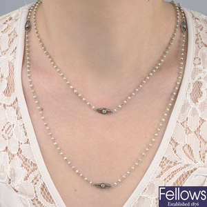 An early 20th century platinum seed pearl chain, with old-cut diamond openwork spacers.