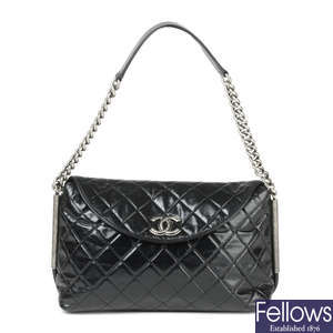 CHANEL - a black glazed crinkled calfskin leather handbag.