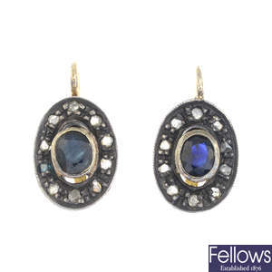 A pair of sapphire and rose-cut diamond cluster earrings.