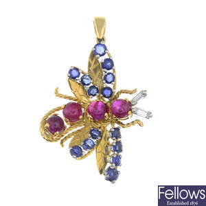 A ruby, sapphire and baguette-cut diamond butterfly pendant.