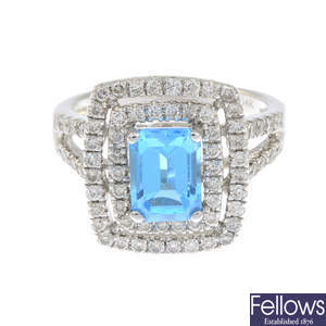 A blue topaz and diamond cluster ring.